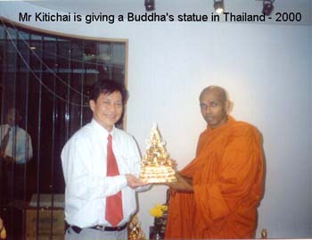 2000 December - Mr Kittichai Donating some buddha's statue in Thailand.jpg